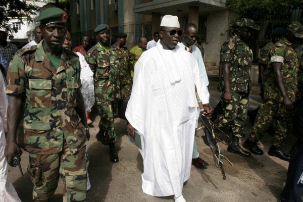 Gambian President Yahya Jammeh leaves a central Banjul polling station after casting his vote for president in Banjul, Gambia, Sept. 22, 2006 (AP photo by Rebecca Blackwell).