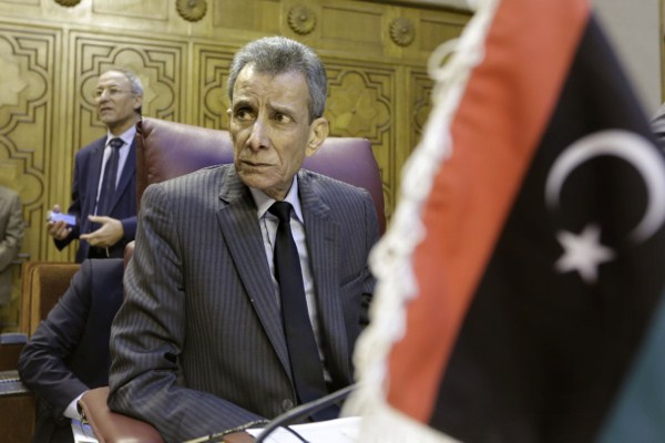 Libyan representative at the Arab League Ashour Abu-Rashed attends an emergency representatives meeting to discuss the conflict in Libya at the Arab League headquarters in Cairo, Egypt, Jan. 5, 2015 (AP photo by Amr Nabil).