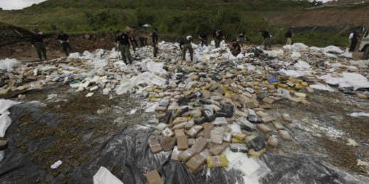 Anti-narcotics police set up drugs to be burned on the outskirts of Panama City, Dec. 5, 2014 (AP photo by Arnulfo Franco).