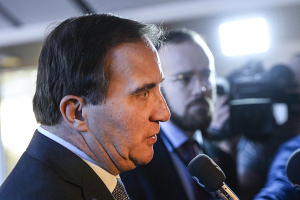 Swedish Prime Minister and Social Democratic Party leader Stefan Lofven answers questions after a press conference at the Swedish Parliament, Stockholm, Sweden, Dec. 27, 2014 (AP photo by Henrik Montgomery).