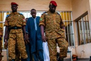 Burkina Faso Lt. Col. Issac Yacouba Zida, right, leaves a government building after meeting with political leaders in Ouagadougou, Burkina Faso, Nov. 4, 2014 (AP photo by Theo Renaut).