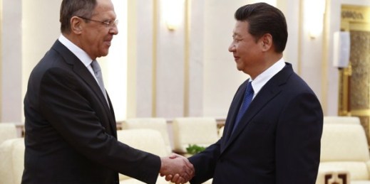 Russian Foreign Minister Sergey Lavrov is greeted by Chinese President Xi Jinping during a meeting at the Great Hall of the People in Beijing, Feb. 2, 2015 (AP photo by Rolex Dela Pena).