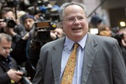 Greek Foreign Minister Nikos Kotzias arrives for a meeting of EU foreign ministers at the EU Council building in Brussels, Jan. 29, 2015 (AP photo by Virginia Mayo).