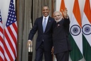 U.S. President Barack Obama and Indian Prime Minister Narendra Modi wave to the media before a meeting in New Delhi, India, Jan. 25, 2015 (AP photo by Manish Swarup).