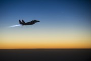 A U.S. Air Force F-15E Strike Eagle aircraft flies over northern Iraq after conducting airstrikes in Syria, Sept. 23, 2014 (DoD photo by Senior Airman Matthew Bruch, U.S. Air Force).