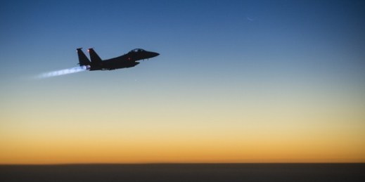A U.S. Air Force F-15E Strike Eagle aircraft flies over northern Iraq after conducting airstrikes in Syria, Sept. 23, 2014 (DoD photo by Senior Airman Matthew Bruch, U.S. Air Force).