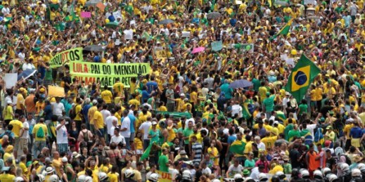 Thousands of demonstrators take part in a protest against the government of Brazil’s President Dilma Rousseff in front of the Brazilian National Congress in Brasilia, March 15, 2015 (AP photo by Eraldo Peres).