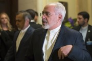 Iranian Foreign Minister Mohammad Javad Zarif walks into another negotiating meeting with U.S. Secretary of State John Kerry over Iran’s nuclear program, Lausanne, Switzerland, March 18, 2015 (AP photo by Brian Snyder).