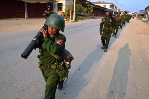 Myanmar soldiers carrying launchers on patrol in Kokang, northeastern Shan State, Feb. 17, 2015 (AP photo by Eleven Media Group).