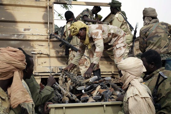 Chadian soldiers collect weapons seized from Boko Haram fighters, Damasak, Nigeria, March 18, 2015 (AP photo by Jerome Delay).