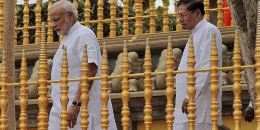 Indian Prime Minister Narendra Modi and Sri Lankan President Maithripala Sirisena walk after paying homage to Sri Maha Bodhi, Anuradhapura, Sri Lanka, March 14, 2015 (AP photo Eranga Jayawardena).