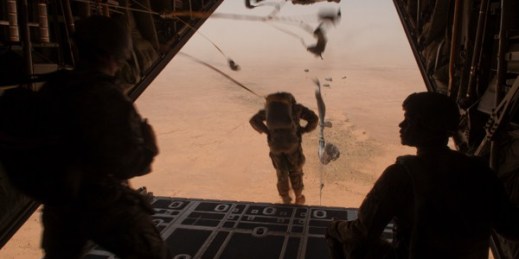 A multinational group of paratroopers exit a C-130 H3 aircraft over a drop zone during Exercise Flintlock 2014, Agadez, Niger, March 2, 2015  (U.S. Air National Guard photo by Tech. Sgt. Eugene Crist).