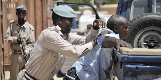 Somali police officers take part in a training exercise to stop and search a vehicle at General Kahiye Police Academy, Mogadishu, Somalia, June 16, 2014 (U.N. photo by Tobin Jones).