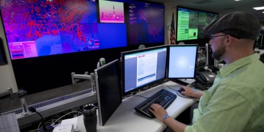 A specialist works at the National Cybersecurity and Communications Integration Center (NCCIC), Arlington, Va., Sept. 9, 2014 (AP photo by Manuel Balce Ceneta).