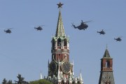 Russian air force helicopters fly over Red Square during a Victory Day parade, which commemorates the 1945 defeat of Nazi Germany, Moscow, Russia, May 9, 2014 (AP photo by Denis Tyrin).