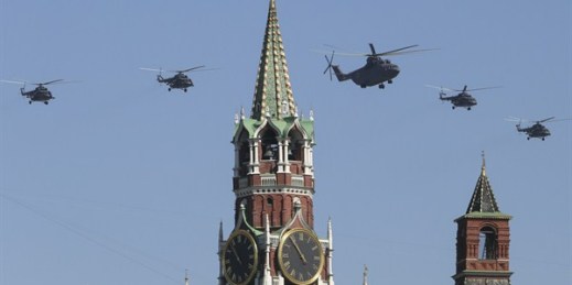 Russian air force helicopters fly over Red Square during a Victory Day parade, which commemorates the 1945 defeat of Nazi Germany, Moscow, Russia, May 9, 2014 (AP photo by Denis Tyrin).