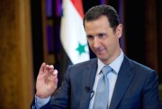 Syrian President Bashar al-Assad gestures during an interview with the BBC, Damascus, Syria, Feb. 10, 2015 (AP photo/SANA).