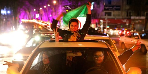 Iranians celebrate the announcement that Iran and six world powers have reached a preliminary nuclear agreement, Tehran, Iran, April 2, 2015 (AP photo by Ebrahim Noroozi).