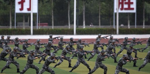 Chinese People’s Liberation Army cadets take part in a bayonet drills at the PLA’s Armored Forces Engineering Academy Base, Beijing, China, July 22, 2014 (AP photo by Andy Wong).