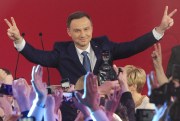 Opposition candidate Andrzej Duda celebrates his victory with supporters, as the first exit polls in the presidential runoff voting are announced, Warsaw, Poland, May 24, 2015 (AP photo by Czarek Sokolowski).