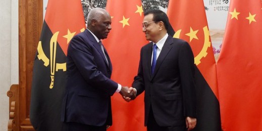 Angolan President Jose Eduardo Dos Santos shakes hands with Chinese Premier Li Keqiang before their meeting at the Great Hall of the People, Beijing, June 9, 2015 (Wang Zhao, Pool photo via AP).