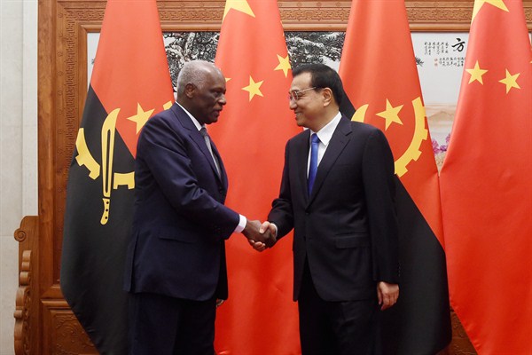 Angolan President Jose Eduardo Dos Santos shakes hands with Chinese Premier Li Keqiang before their meeting at the Great Hall of the People, Beijing, June 9, 2015 (Wang Zhao, Pool photo via AP).