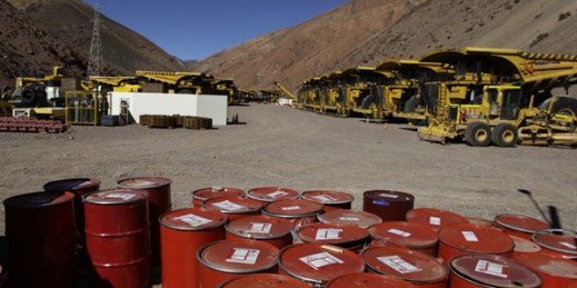 Mining machinery and barrels with chemicals sit on the facilities of Barrick Gold Corp's Pascua Lama project, northern Chile, May 23, 2013 (AP photo by Jorge Saenz).