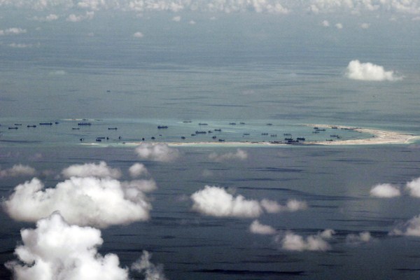 Aerial photo showing China’s alleged reclamation of Mischief Reef in the Spratly Islands, South China Sea, May 11, 2015 (Ritchie B. Tongo, Pool Photo via AP).