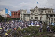 Demonstrators gather outside the National Palace demanding the resignation of Guatemalan President Otto Perez Molina, Guatemala City, June 13, 2015 (AP photo by Luis Soto).