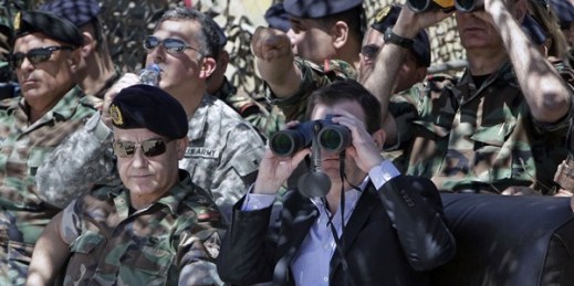 U.S. Ambassador to Lebanon David Hale looks through binoculars during a live-fire demonstration of advanced TOW-II missile, Taybeh, Lebanon, June 10, 2015 (AP photo by Bilal Hussein).