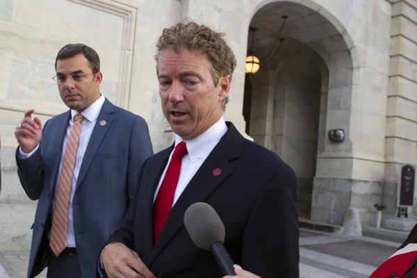 Sen. Rand Paul talks with a reporter as he leaves the Capitol following his address to the Senate, Washington, May 31, 2015 (AP photo by Cliff Owen).