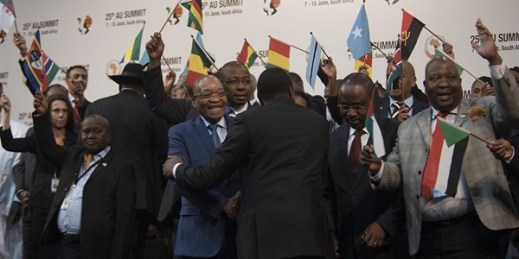 South African President Jacob Zuma, cenetr, and delegates prepare for a photo op at the African Union Summit, Johannesburg, June 14 2015 (AP photo by Shiraaz Mohamed).