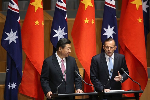 Chinese President Xi Jinping and Australian Prime Minister Tony Abbott speak at a press conference, Canberra, Nov. 17, 2014 (AP photo by Rick Rycroft).
