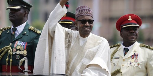 Nigerian President Muhammadu Buhari salutes his supporters during his inauguration, Abuja, Nigeria, May 29, 2015 (AP photo by Sunday Alamba).