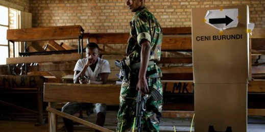 An armed soldier gets ready to cast his vote in the presidential elections in Bujumbura, Burundi, July 21, 2015 (AP photo/Jerome Delay).
