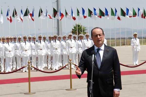 French President Francois Hollande delivers a speech upon his arrival at Houari Boumediene airport in Algiers, Algeria, June 15, 2015 (AP photo by Sidali Djarboub).