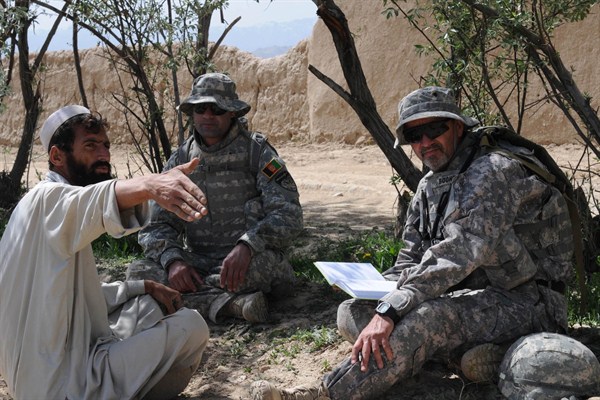 Dr. Richard R. Boone interviews local residents to find out about their attitudes and daily lives, Baraki Barak District, Logar province, Afghanistan, April 25, 2010 (U.S. Army photo).