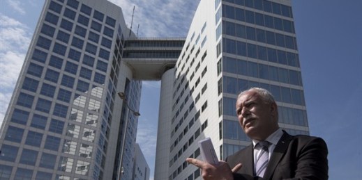 Palestinian Foreign Minister Riyad Al-Maliki waits to give an interview outside the International Criminal Court, The Hague, Netherlands, June 25, 2015 (AP photo by Peter Dejong).