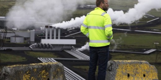 An employee surveys Reykjavik Energy's Hellisheidi geothermal power plant, Reykjavik, Iceland, July 28, 2011 (AP photo by Brennan Linsley).