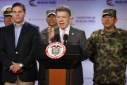 Colombian President Juan Manuel Santos announces that at least 26 leftist rebels have been killed in a raid in western Colombia, the presidential palace in Bogota, May 22, 2015 (AP photo Fernando Vergara).
