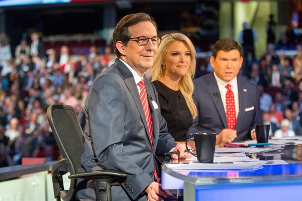 Fox News moderators Chris Wallace, Megyn Kelly and Bret Baier speak before Republican presidential candidates take the stage for the first Republican presidential debate Cleveland, Oh. Aug. 6, 2015 (AP photo by Andrew Harnik).