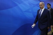 Israeli Prime Minister Benjamin Netanyahu arrives for the weekly cabinet meeting, Jerusalem, Aug. 2, 2015 (Gali Tibbon/Pool Photo via AP).