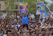 Supporters of former Sri Lankan president and parliamentary candidate Mahinda Rajapaksa cheer for him during an election campaign rally, Anuradhapura, Sri Lanka, July 17, 2015 (AP photo by Eranga Jayawardena).