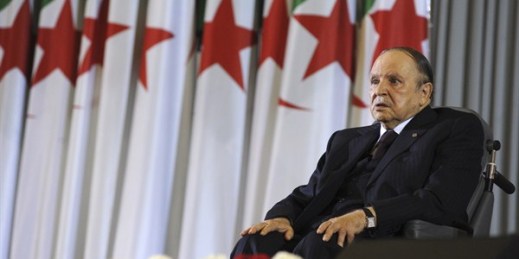 Algerian President Abdelaziz Bouteflika sits on a wheelchair after taking oath as president, Algiers, April 28, 2014 (AP photo by Sidali Djarboub).