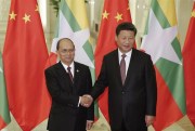 Chinese President Xi Jinping shakes hands with Myanmar President Thein Sein at the Great Hall of the People, Beijing, Sept. 4, 2015 (AP photo by Lintao Zhang).