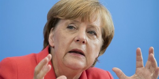 German Chancellor Angela Merkel gestures during her annual summer news conference, Berlin, Germany, Aug. 31, 2015 (AP photo by Gero Breloer).
