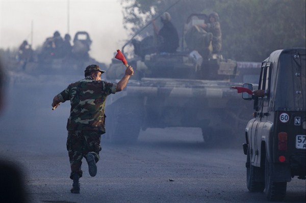 A convoy of Azerbaijani army tanks moves in the direction of Agdam, Azerbaijan, Aug. 2, 2014. (AP photo by Abbas Atilay).
