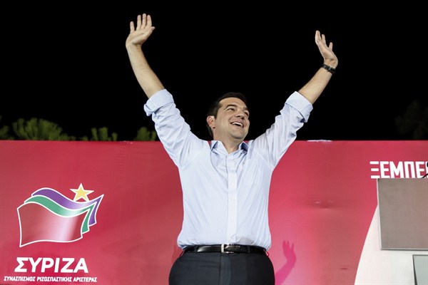 Alexis Tsipras, leader of radical left Syriza party and former prime minister, waves to supporters during a pre-election rally, Athens, Greece, Sept. 13, 2015 (AP photo by Yorgos Karahalis).
