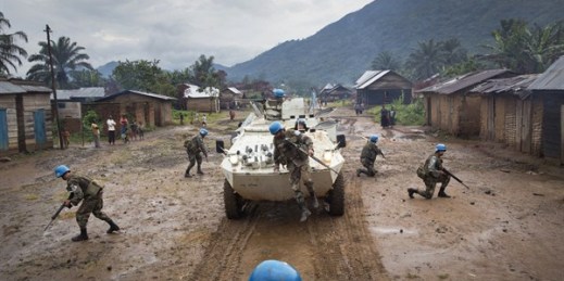 Peacekeepers serving with the U.N. Organization Stabilization Mission in the Democratic Republic of the Congo (MONUSCO) patrol the town of Pinga, North Kivu Province, Democratic Republic of the Congo, Dec. 4, 2013 (U.N. photo by Sylvain Liechti).