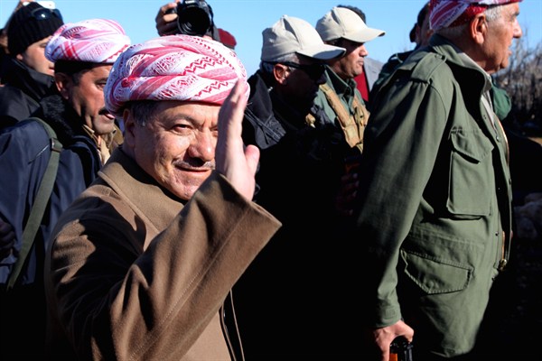 Iraqi Kurdistan Regional Government President Massoud Barzani arrives to support Kurdish forces as they head to battle Islamic State militants, Sinjar, Iraq, Dec. 21, 2014 (AP photo by Zana Ahmed).